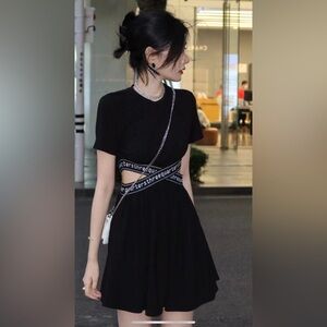 Black Cutout Dress with Chain  three quarter